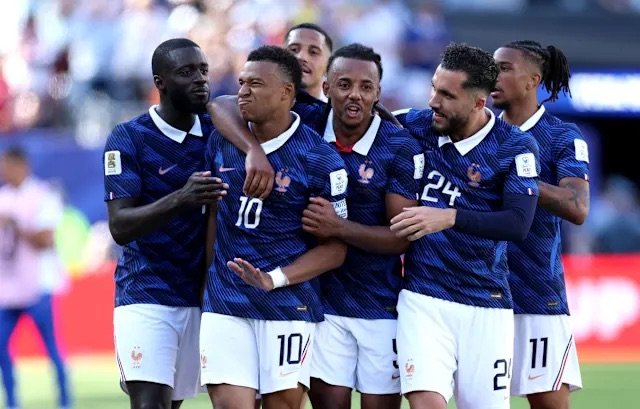 France players celebrate with Kylian Mbappé during their 2026 World Cup win over Senegal