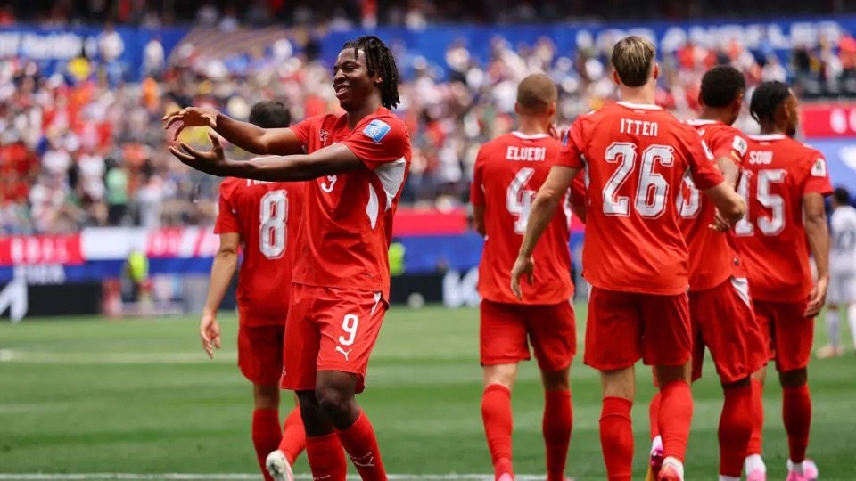 Johan Manzambi celebrates with Switzerland teammates after scoring against Bosnia and Herzegovina
